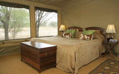 Bed in safari tent Tanzania ecotours